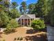 Traditional home featuring mature trees and beautiful landscaping, adding to its curb appeal at 2595 Winthrope Way, Lawrenceville, GA 30044