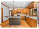 Stylish kitchen with stainless steel appliances, granite counters, and custom cabinetry at 2595 Winthrope Way, Lawrenceville, GA 30044