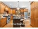 Bright, updated kitchen with stainless appliances, a kitchen island, and bar stool seating at 2595 Winthrope Way, Lawrenceville, GA 30044