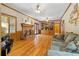 Warm living room with hardwood floors, fireplace, and built-in shelving at 2595 Winthrope Way, Lawrenceville, GA 30044