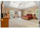 Spacious main bedroom featuring a tray ceiling and ample natural light at 2595 Winthrope Way, Lawrenceville, GA 30044