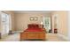 Serene main bedroom with neutral walls, white trim, and a comfortable bed at 2595 Winthrope Way, Lawrenceville, GA 30044