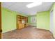 Bright office/project room with built-in shelving and cabinets, perfect for work or hobbies at 2595 Winthrope Way, Lawrenceville, GA 30044