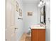 Functional powder room with vanity and tile flooring at 2595 Winthrope Way, Lawrenceville, GA 30044
