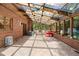 Spacious sunroom with brick walls, clerestory windows, and plenty of seating at 2595 Winthrope Way, Lawrenceville, GA 30044