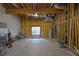 Unfinished basement featuring exposed ceiling with HVAC, concrete floor, and window for natural light at 402 Wood Chase Ln, Canton, GA 30114