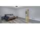 Large bedroom showcasing a neutral color palette and access to the ensuite bathroom at 402 Wood Chase Ln, Canton, GA 30114