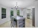 Kitchen featuring table seating for four and stainless steel appliances at 402 Wood Chase Ln, Canton, GA 30114