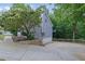 View of the house with a basement garage and an elevated outdoor deck at 402 Wood Chase Ln, Canton, GA 30114