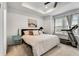 Bright bedroom with tray ceiling, a large bed, and plenty of natural light from the windows at 6635 Beacon Dr, Atlanta, GA 30328
