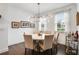 Stylish dining room with modern chandelier, neutral decor, and bright natural light at 6635 Beacon Dr, Atlanta, GA 30328