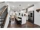 Modern kitchen showcases a large island, stainless appliances, and an open layout to the living spaces at 6635 Beacon Dr, Atlanta, GA 30328