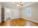Inviting bedroom featuring gleaming hardwood floors and a tranquil view from a well-lit window at 1539 Marbut Se Ave, Atlanta, GA 30316