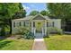 Charming cottage-style home with a welcoming front porch and a beautifully landscaped front yard at 1539 Marbut Se Ave, Atlanta, GA 30316