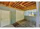 A single car garage and white door sit below an elevated deck at 1539 Marbut Se Ave, Atlanta, GA 30316