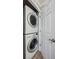 Efficient laundry area with stacked LG washer and dryer for space-saving convenience at 1539 Marbut Se Ave, Atlanta, GA 30316