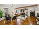 Open concept living room with hardwood floors and a fireplace at 1539 Marbut Se Ave, Atlanta, GA 30316