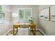Bright home office with a wood desk, comfortable chair, and stylish decor at 1539 Marbut Se Ave, Atlanta, GA 30316