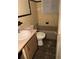 Bathroom with a toilet, a bathtub, and a sink at 449 Hamilton E Holmes Nw Dr, Atlanta, GA 30318