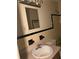 Bathroom with a cream sink and a mirror at 449 Hamilton E Holmes Nw Dr, Atlanta, GA 30318