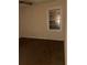 Empty bedroom featuring carpet, a window, and neutral paint at 449 Hamilton E Holmes Nw Dr, Atlanta, GA 30318
