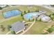 Community with a pool, clubhouse, tennis court, basketball court and green space at 556 Emporia Loop, Mcdonough, GA 30253