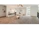 Spacious bonus room with plush carpeting, a ceiling fan, and plenty of natural light at 5940 Plantation Dr, Roswell, GA 30075