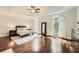 Spacious main bedroom features hardwood floors, and lots of natural light at 5940 Plantation Dr, Roswell, GA 30075