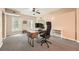 Office area with contemporary desk, ergonomic chair, and plenty of natural light at 5940 Plantation Dr, Roswell, GA 30075