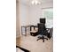 Bedroom featuring neutral paint, a home office, and carpeted floor at 2592 King Louis Ne Rd, Conyers, GA 30012