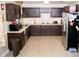Functional kitchen featuring ample cabinet space, modern appliances, and a practical layout for cooking at 2592 King Louis Ne Rd, Conyers, GA 30012