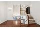 Home foyer with beautiful wood floors, high ceilings, and a staircase at 4096 Audubon Dr, Marietta, GA 30068