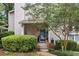 Entrance of the house with a well-kept garden at 4096 Audubon Dr, Marietta, GA 30068