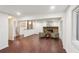 Spacious living room with hardwood floors and brick fireplace at 4096 Audubon Dr, Marietta, GA 30068