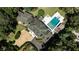 An aerial view of a sprawling home with a luxurious backyard pool and meticulously maintained landscaping at 4309 Sentinel Post Nw Rd, Atlanta, GA 30327
