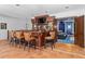 A custom-built bar with a flat-screen TV, bar stools, and a pass-through to another room at 4309 Sentinel Post Nw Rd, Atlanta, GA 30327