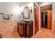 An elegant bathroom with a custom vanity and sauna in the background creating a spa like retreat at 4309 Sentinel Post Nw Rd, Atlanta, GA 30327