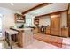 Charming kitchen with wooden cabinets, a breakfast bar, and modern appliances at 4309 Sentinel Post Nw Rd, Atlanta, GA 30327