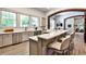 Modern kitchen with stainless steel appliances, breakfast bar, and view to living area at 4309 Sentinel Post Nw Rd, Atlanta, GA 30327