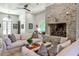Spacious living room with stone fireplace and ample seating at 4309 Sentinel Post Nw Rd, Atlanta, GA 30327
