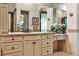 Stylish bathroom vanity area with ample storage, granite countertop and decorative tile accents at 4309 Sentinel Post Nw Rd, Atlanta, GA 30327