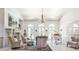 Large office area with fireplace, elegant furniture, and an abundance of natural light at 4309 Sentinel Post Nw Rd, Atlanta, GA 30327