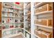 Walk-in pantry with organized shelving and storage baskets at 4309 Sentinel Post Nw Rd, Atlanta, GA 30327