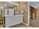 This spacious bathroom features double vanities, storage, and great lighting at 530 Chicapoo Dr, Marietta, GA 30066