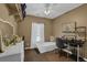 Bedroom boasts a single bed, desk space, and ample storage with a white dresser and shelving at 530 Chicapoo Dr, Marietta, GA 30066