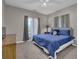 This bedroom features neutral walls, gray carpeting, and tasteful decor at 530 Chicapoo Dr, Marietta, GA 30066