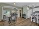 Cozy dining area adjacent to kitchen, featuring views to other living areas at 530 Chicapoo Dr, Marietta, GA 30066
