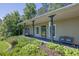 Inviting covered front porch with seating, perfect for enjoying the well-manicured landscaping at 530 Chicapoo Dr, Marietta, GA 30066