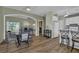 A spacious living room and dining area features hardwood floors and abundant natural light at 530 Chicapoo Dr, Marietta, GA 30066