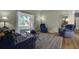 Comfortable living room with hardwood floors, featuring views to the outside and other rooms at 530 Chicapoo Dr, Marietta, GA 30066